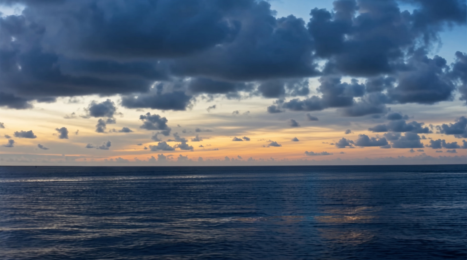 Calm ocean at sunset